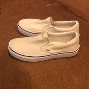 Cream color slip on vans